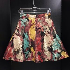 Jealous Tomato flared skirt, multicolored metallic fabric, zipper in back